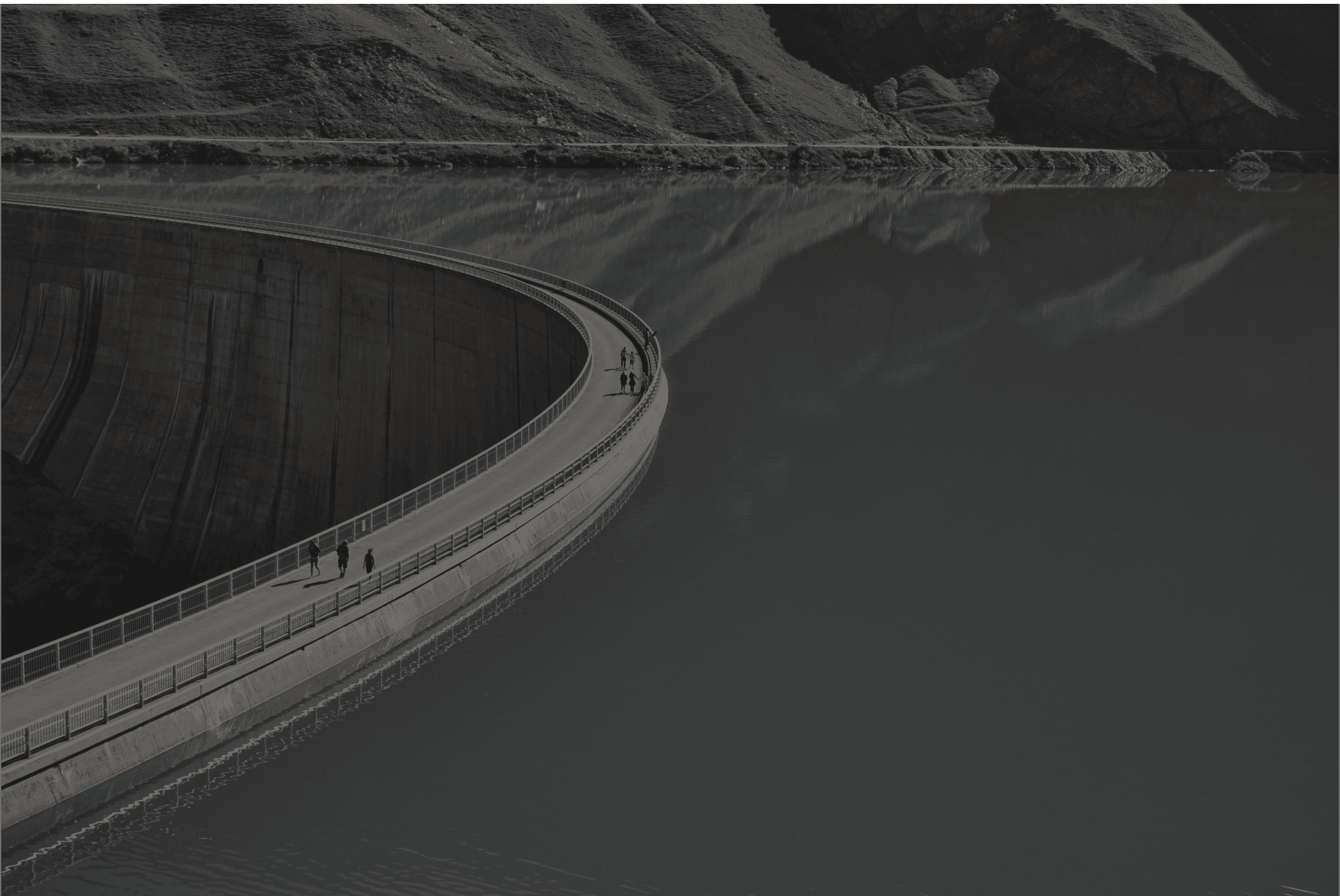 desaturated-dam-with-tiny-people