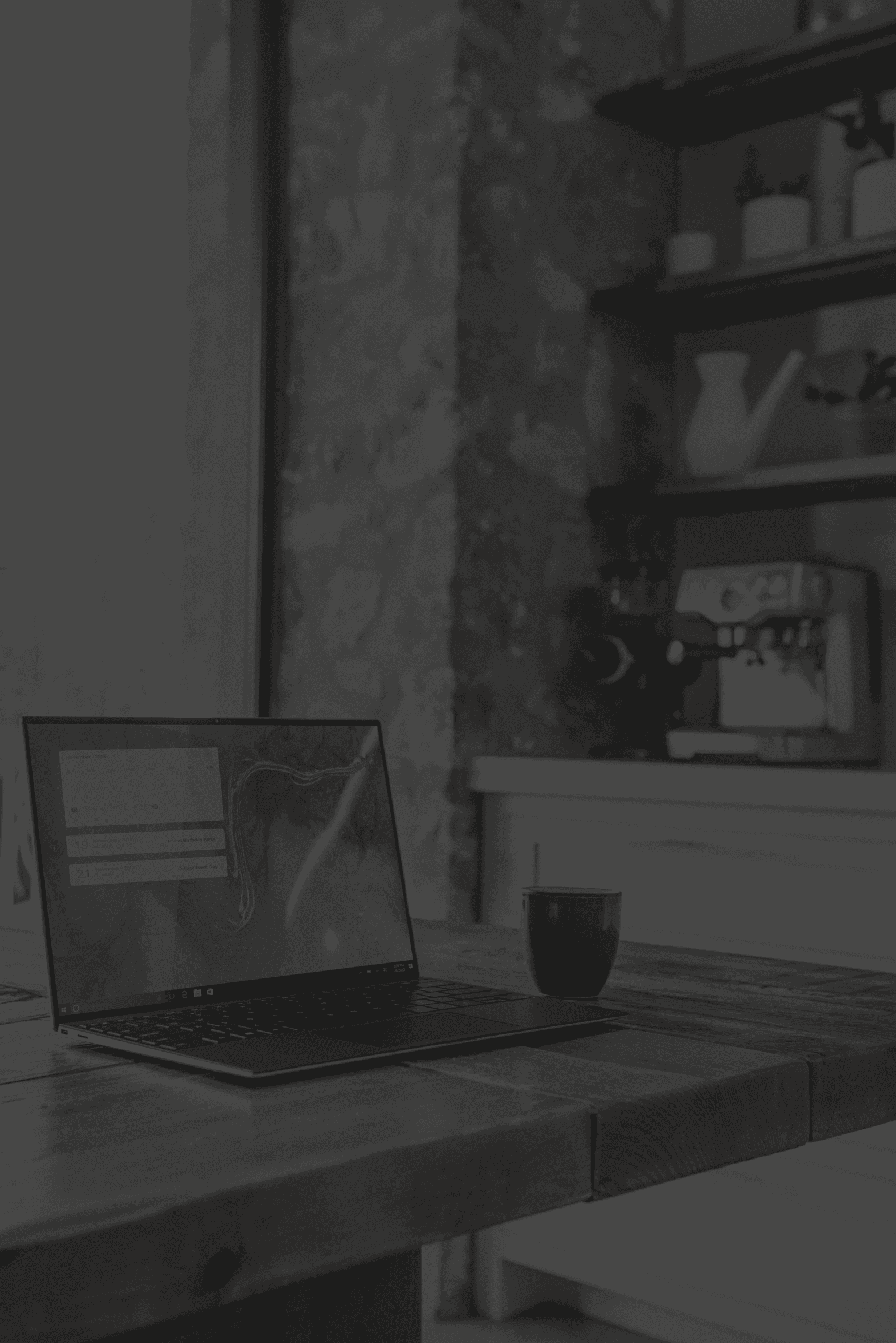 desaturated-laptop-on-desk